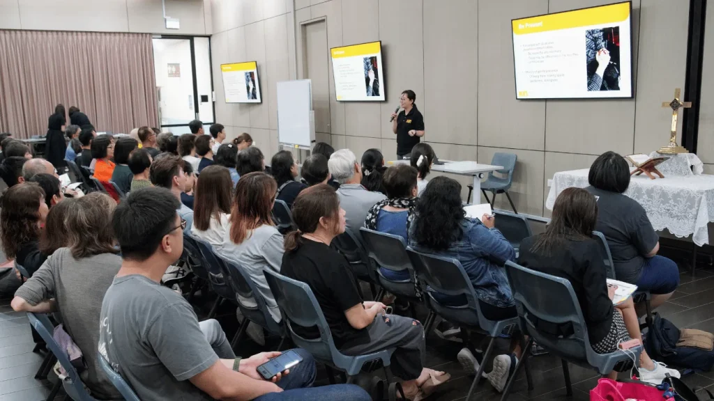 Speaker Presenting at the Being a Neighbour Workshop by Ian Yap