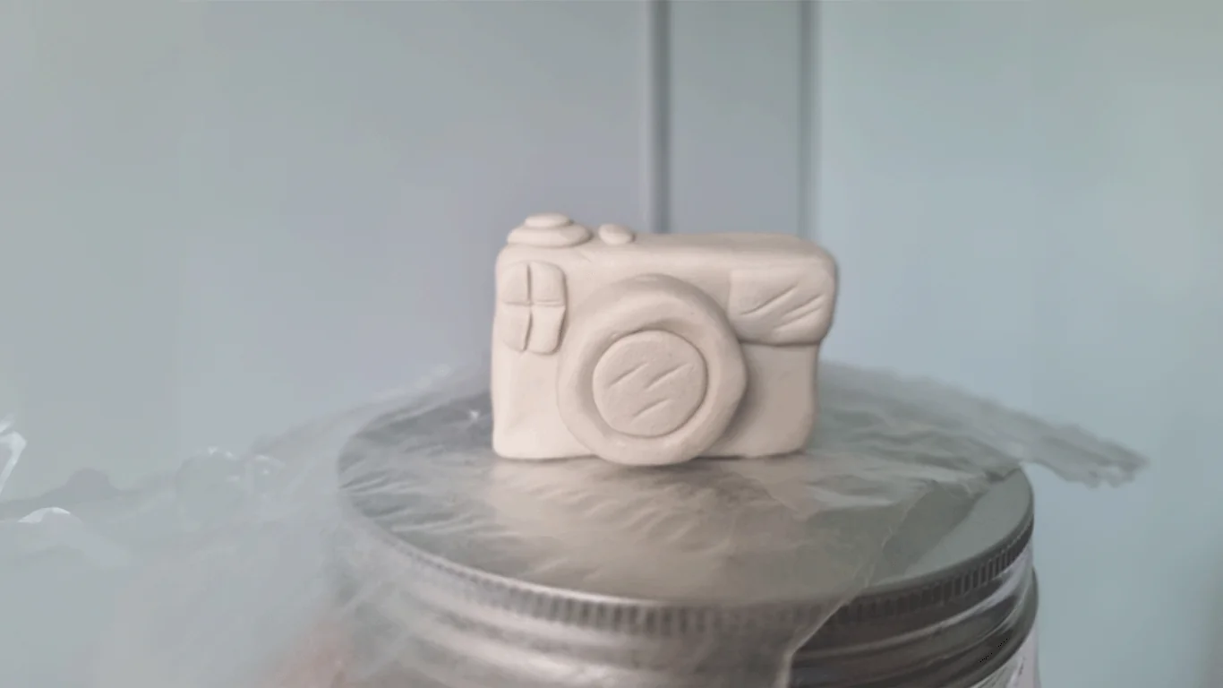 Clay Camera Sculpture on Jar